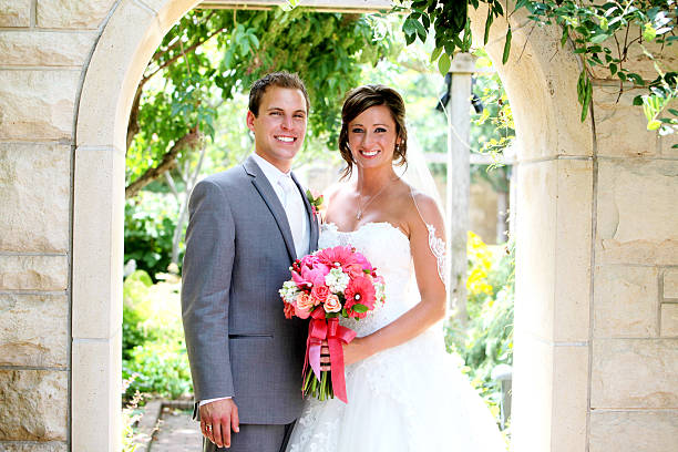 Amazing Bride and Groom Happy Wedding Dress Flowers stock photo