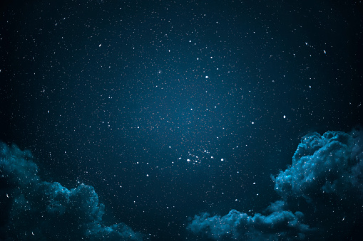 Cielo de noche con estrellas y nubes. photo