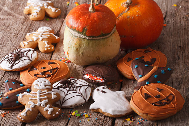 istock Beautiful gingerbread for Halloween and fresh pumpkin. horizontal 532386114