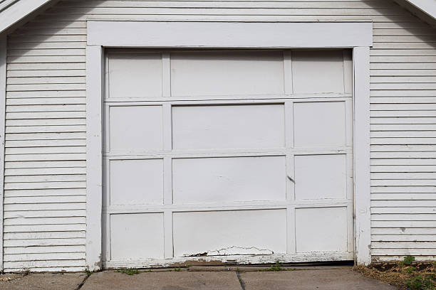 istock Garage door with peeling paint 532388254