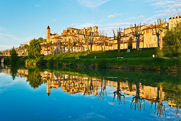 Cityscape of Auch reflecting in Gers River