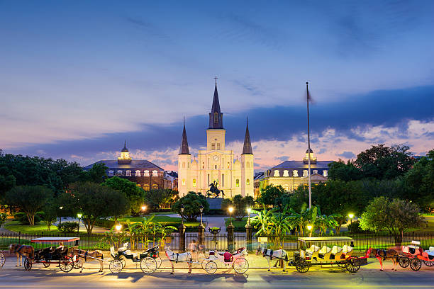 New Orleans at Jackson Square New Orleans, Louisiana, USA at St. Louis Cathedral and Jackson Square. jackson square stock pictures, royalty-free photos & images