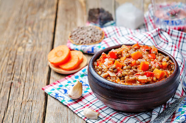 istock Vegan green lentil tomatoes stew 532390246