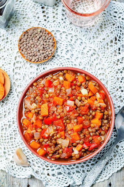 istock Vegan green lentil tomatoes stew 532390284