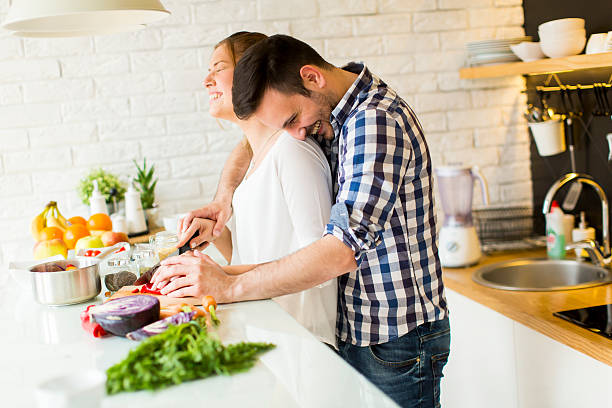 istock Loving couple preparing healthy food 532390480