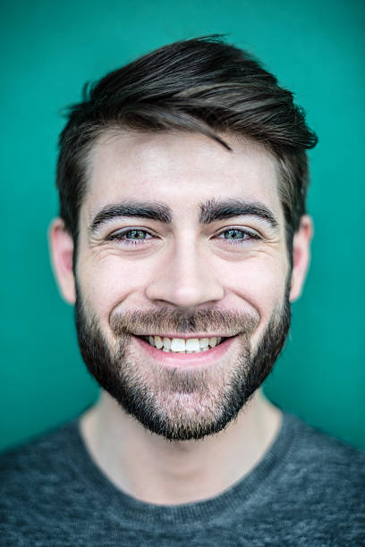 istock Close up portrait of a smiling young man with beard 532390750