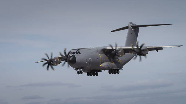 istock Miltary transport aircraft in flight 532393066