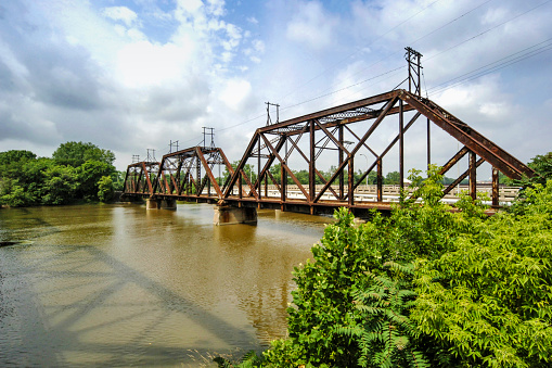 Rusting railroad bridge over the River Raisin at Monroe MI