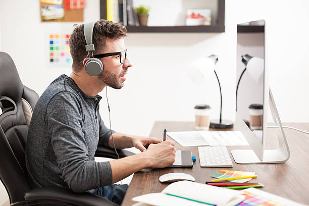 istock Designer working and listening to music 532395548