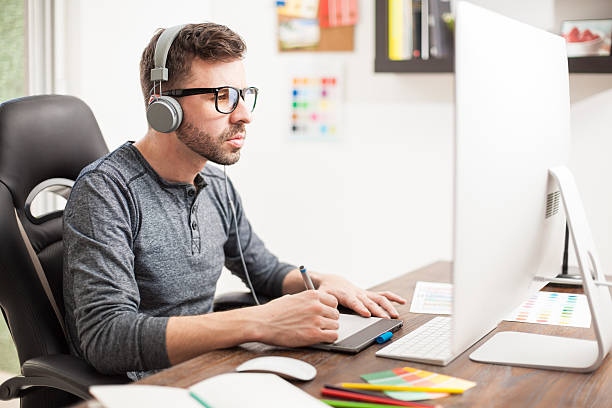 istock Designer wearing glasses and headphones 532395600