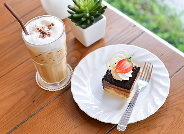 istock Cheesecake with chocolate with fresh strawberry and ice cappuccino 532398248