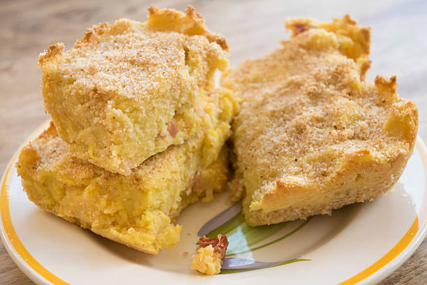 istock wedge of potatoes pie with cured ham 532398634