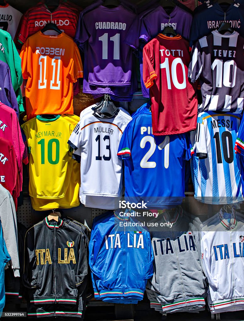 Soccer Uniform Florence, Italy - June 28, 2014: sale of club T-shirt of national football team for European Championship or World Championship Soccer Stock Photo