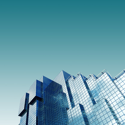 Abstract pattern, facade of a minimalist business building, leaving space for text.