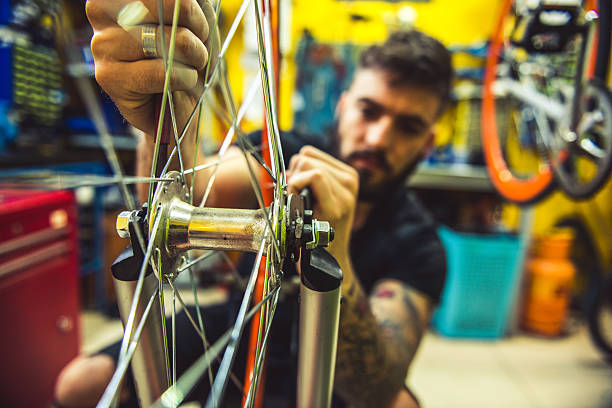 istock Repairing a bike 532402314