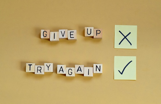 A picture showing that you should always try again instead of giving up.