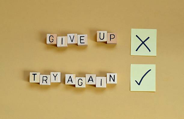 Motivational Concept A picture showing that you should always try again instead of giving up. again stock pictures, royalty-free photos & images