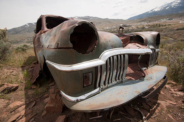 istock Old abandoned car with bullet holes 532407256