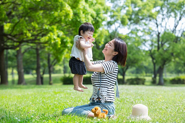 istock Mother holding a baby 532408124