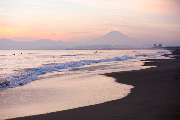 istock Beautiful sunset on the beach and Mt Fuji 532409424