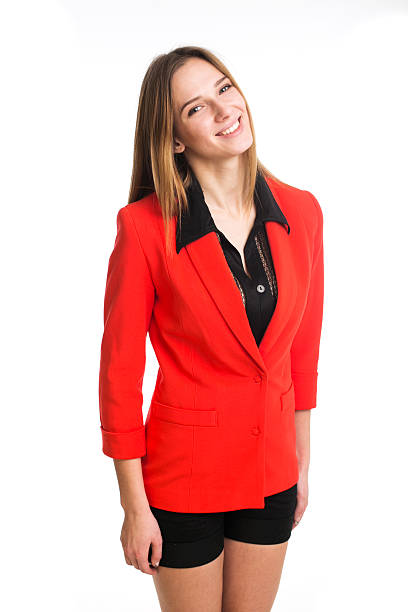 istock Pretty girl in red jacket posing in studio 532410927