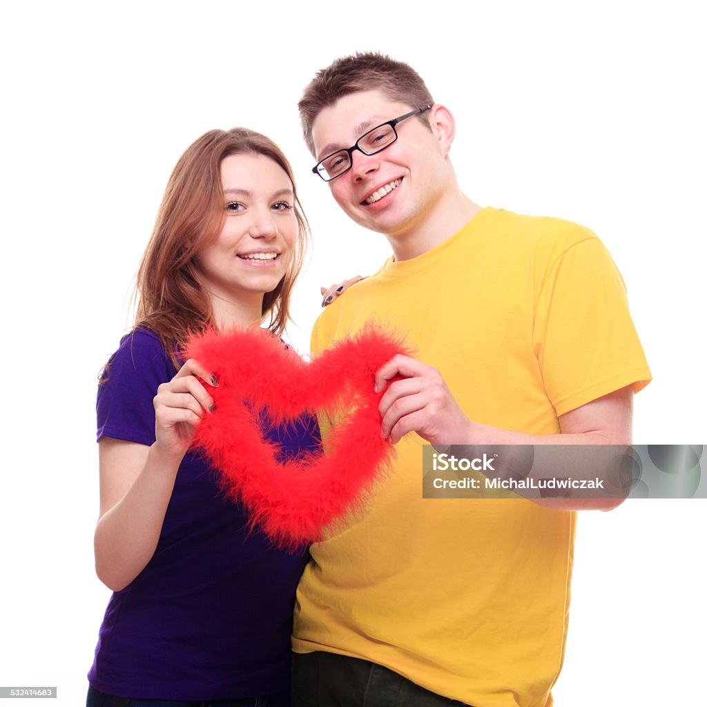 Young people in love holding heart 2015 Stock Photo