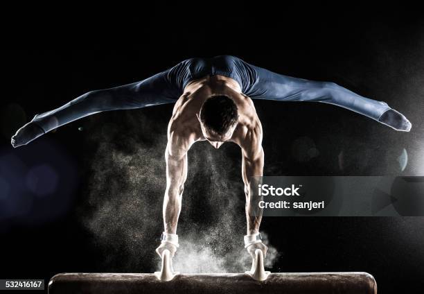 Male Gymnast Doing Handstand On Pommel Horse Stock Photo - Download Image Now - Gymnastics, Sport, Artistic Gymnastics