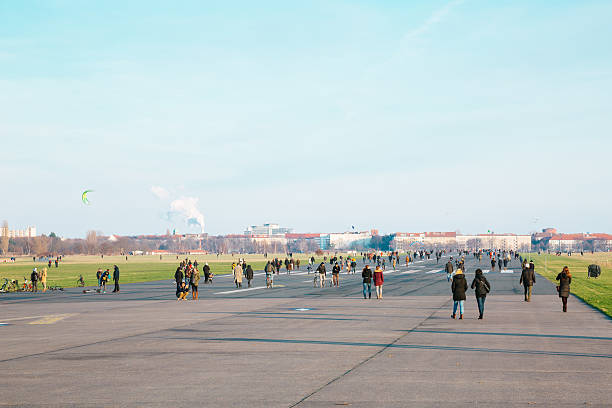 Berlin, Germany - January 1, 2015: Cycling and other sporting activities taking place in Tempelhof Airport, Berlin, Germany. The airport ceased operation in 2008 and is now used for sports and events.