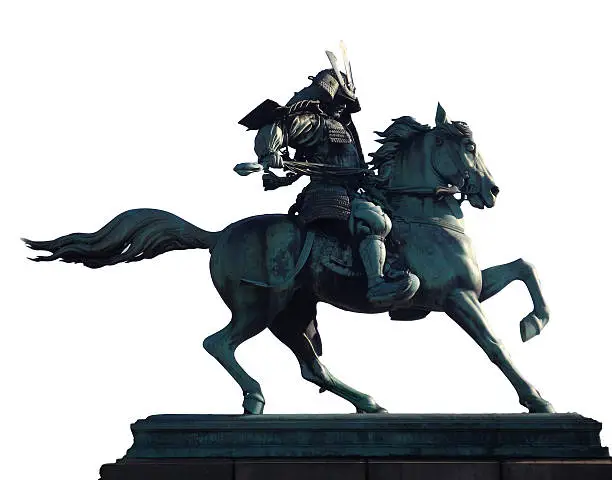 This bronze Kusunoki Masashige Statue is in the city park, outside of the Imperial Palace in Tokyo Japan. The statue was commissioned by the Japanese government around 1880 and took workers 2 years to build. Kusunoki was an ancient Japanese hero that became the patron saint of Kamikaze pilots during WWII.