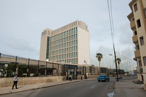 Havana, Cuba - December 2, 2014: Cuban security personnel surround the perimeter of the United States Interests Section in Havana, Cuba.