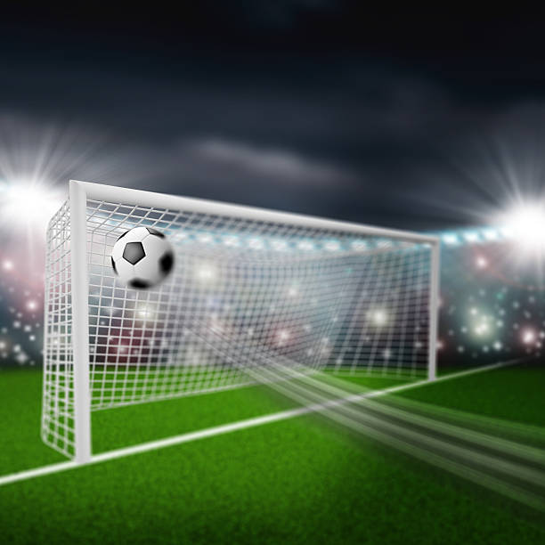 istock soccer ball flies into the goal 532443907