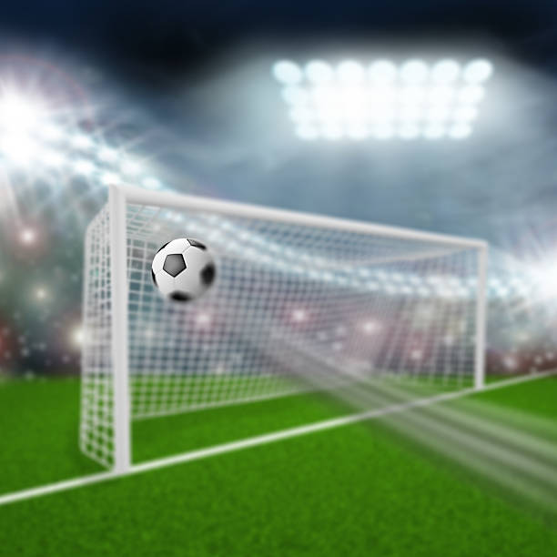 istock soccer ball flies into the goal 532443923