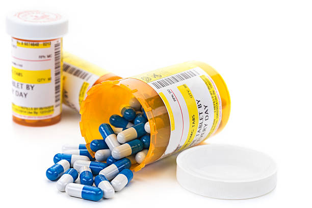 istock Prescription Medication in Orange Pill Bottles 532446505