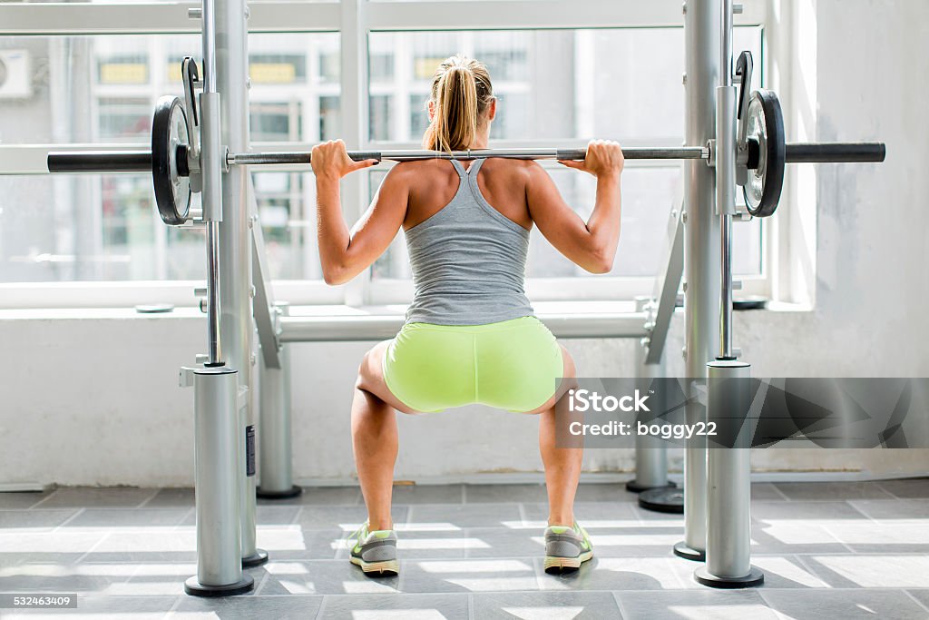 Young woman training in the gym Activity Stock Photo