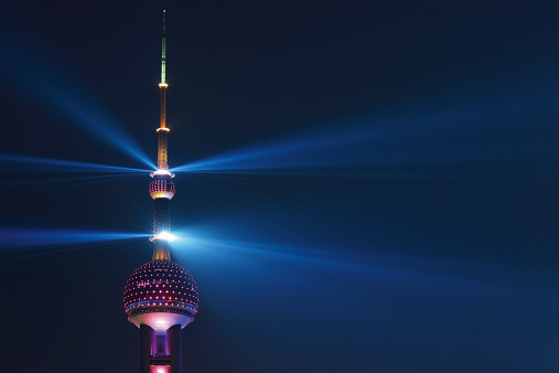 Oriental Pearl Tower and spotlights light night in New Year's Day 2015, Shanghai.