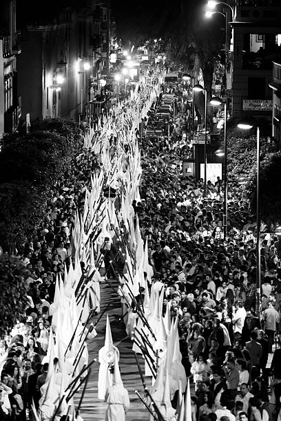 istock Night procession through Seville by penitents 532464611