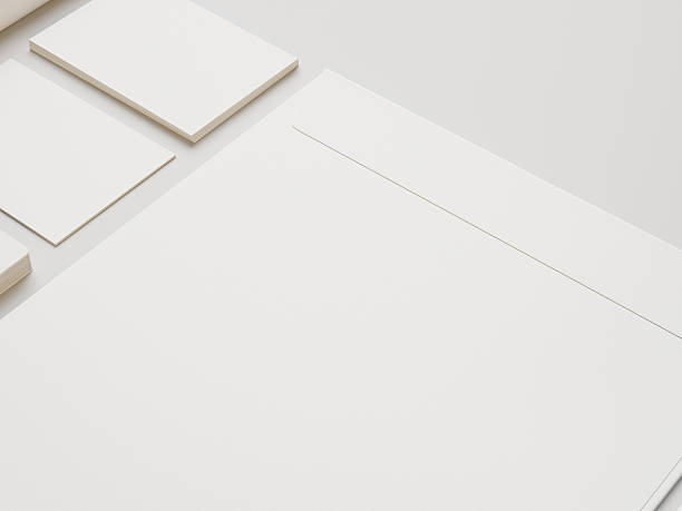 istock White envelope and cards on white paper background 532466413