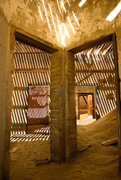 istock Abandoned home buried in sand 532466725
