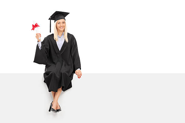 istock Female graduate student holding a diploma 532467245