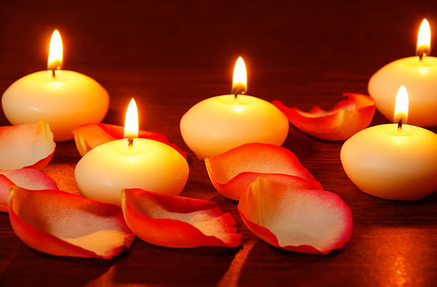 istock Petals of roses and candles 532468641