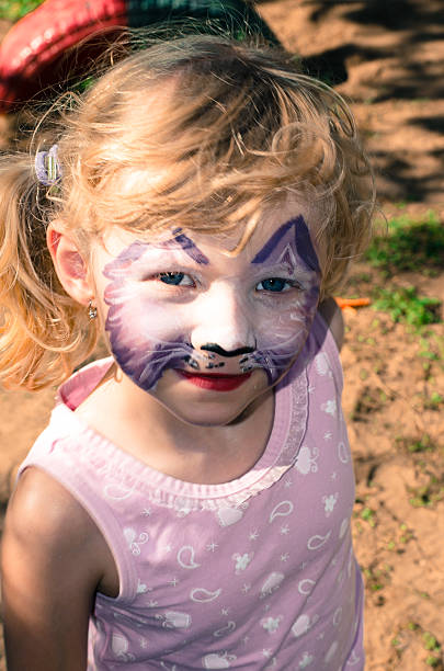istock girl with face painting 532468877