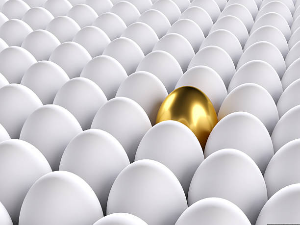 istock Golden egg standing out from the others. 3d render 532469687