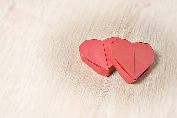 istock Two red origami paper heart 532481103