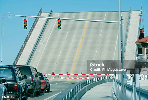 Cars Waiting At Raised Drawbridge Over River In Seattle Wa Stock Photo - Download Image Now