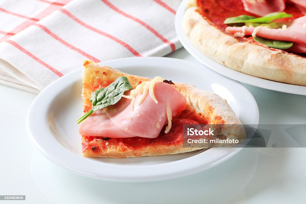 Pizza with ham and cheese Tasty pizza with ham and cheese Cheese Stock Photo