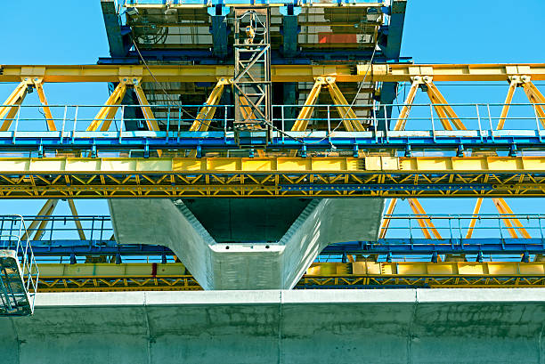 istock Machinery carrying section of elevated light rail in Seattle WA 532484043