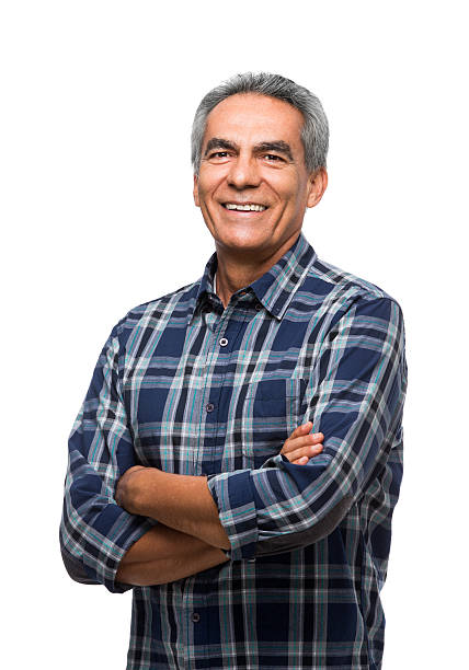 Happy mature man smiling Portrait of a happy mature man smiling isolated on white background 55 59 years stock pictures, royalty-free photos & images