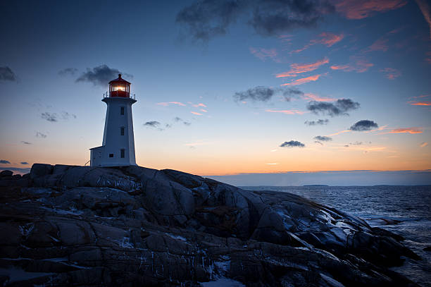 istock Peggy's Cove Lighthouse at Sunset, Nova Scotia, Canada 532485635