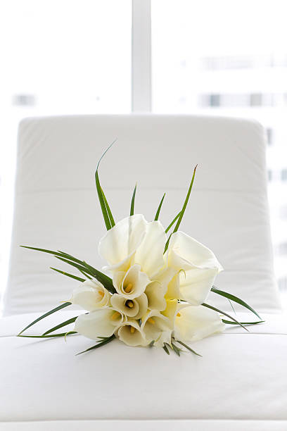 istock Calla lily bride bouquet on seat 532486559