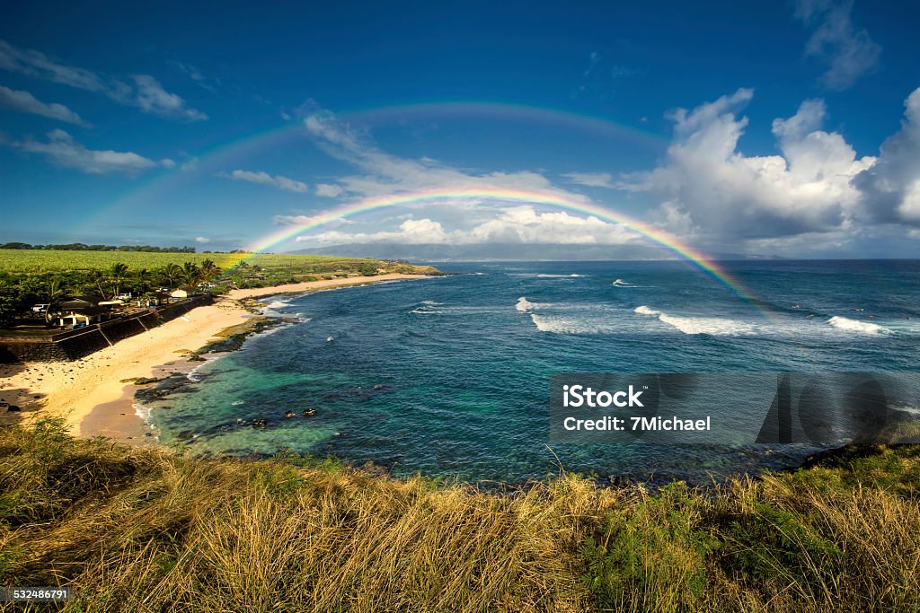 Ho'okipa Beach Park, north shore of Maui, Hawaii Rainbow over Ho'okipa Beach Park, famous surf spot on the north shore of Maui, Hawaii Maui Stock Photo